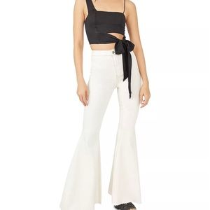 Free people white “just float on  flare jeans”